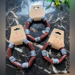Handmade orange ,White and black Beaded Bracelets By Michelle